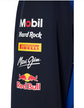 Close-up of motorsport-inspired graphics on a dark navy jacket sleeve