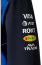 Close-up of racing-style graphics on a navy bomber jacket sleeve