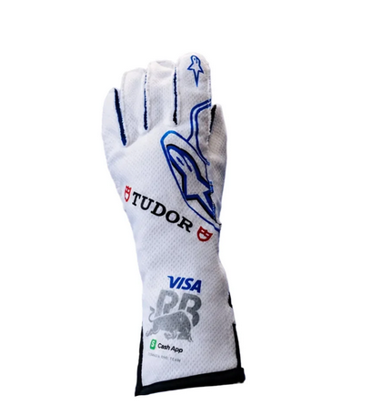 Side view of white racing-style glove with blue graphic detail